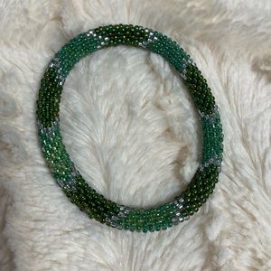 Green snake patterned bracelet